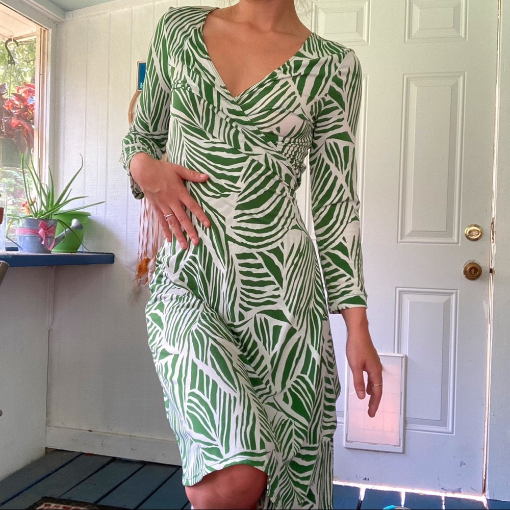 Slinky animal print wrap dress 💚 
From BCBGMaxazria